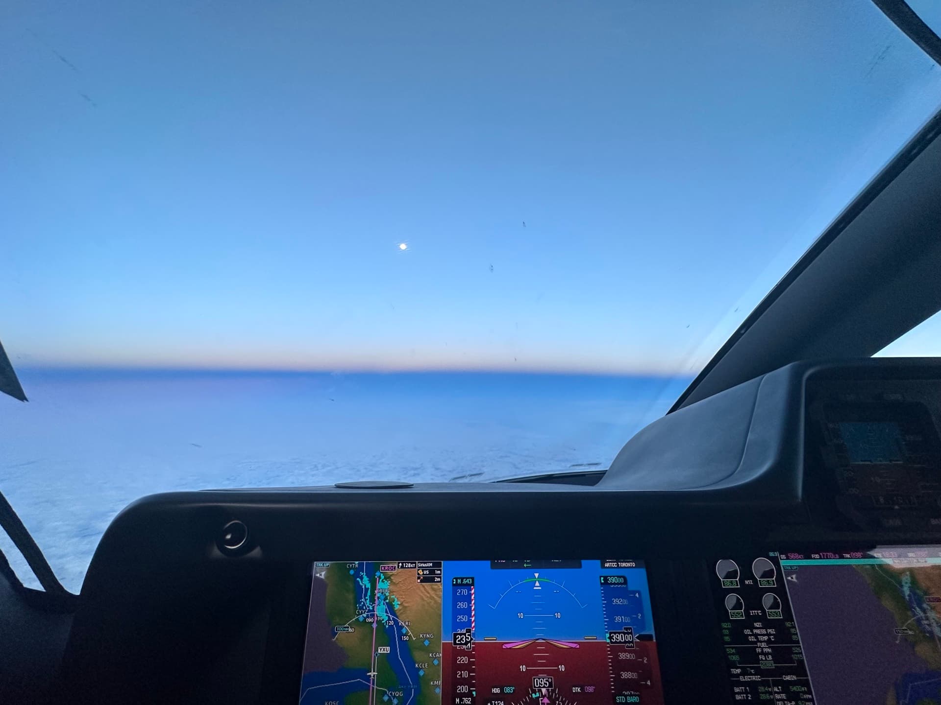 Embraer Phenom 300 on the ramp at golden hour